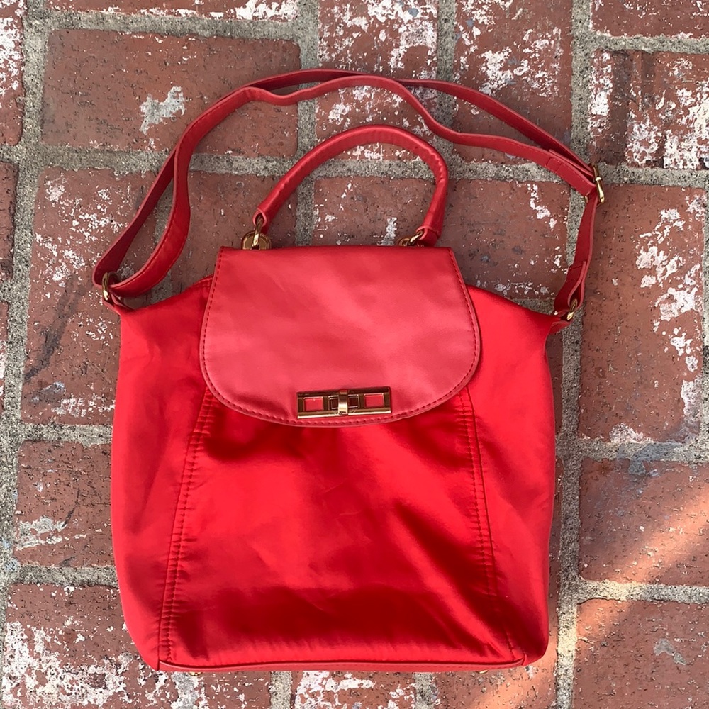 Red faux leather and nylon bag